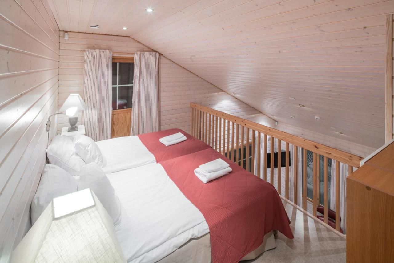 Отель Lapland Hotels Ounasvaara Chalets Рованиеми